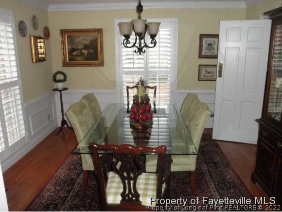2723 Huntington Road Fayetteville, NC 28303 - Photo 6 of 25 a view of a dining room with furniture