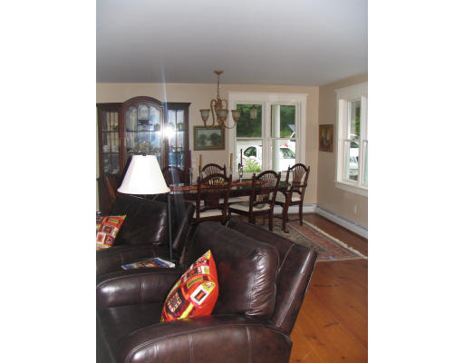 27 Lower Dam Way Dunstable, MA 01827 - Photo 14 of 19 a living room with furniture and floor to ceiling window