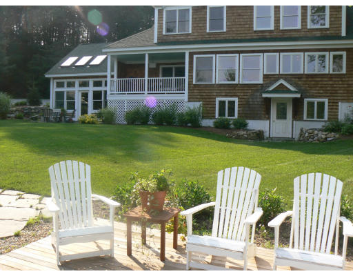 27 Lower Dam Way Dunstable, MA 01827 - Photo 2 of 19 a front view of a house with a yard