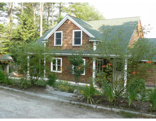 27 Lower Dam Way Dunstable, MA 01827 - Photo 6 of 19 a front view of a house with a yard