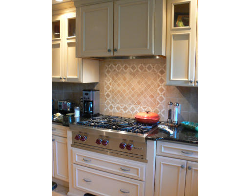27 Lower Dam Way Dunstable, MA 01827 - Photo 10 of 19 a kitchen with stainless steel appliances granite countertop a stove and a microwave