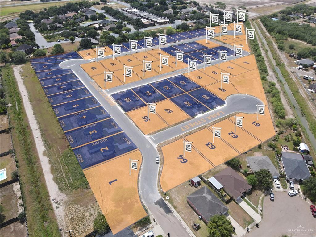 an aerial view of a large buildings with yard