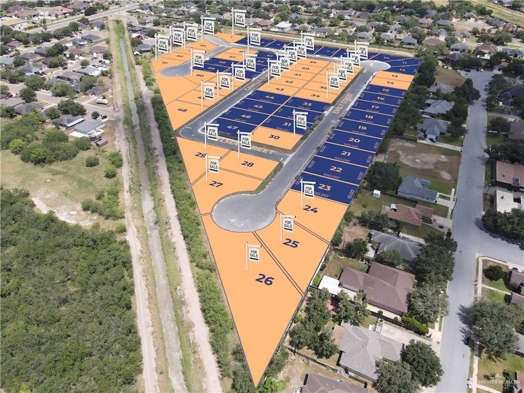 2204 Lana Street Weslaco, TX 78596 - Photo 4 of 6 an aerial view of a residential apartment building with an outdoor space