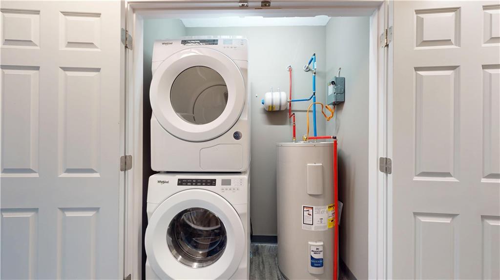 1450 Fifth Avenue, Unit 305 Pittsburgh, PA 15219 - Photo 18 of 22 a close view of a utility room with dryer and washer