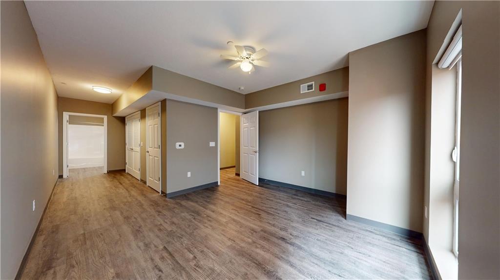 1450 Fifth Avenue, Unit 305 Pittsburgh, PA 15219 - Photo 10 of 22 a view of a livingroom with a chandelier