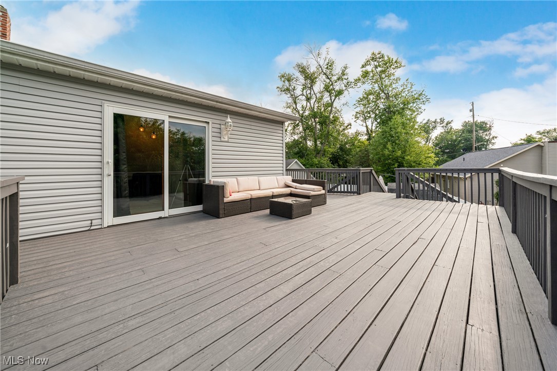6873 Lake Road Madison, OH 44057 - Photo 24 of 29 Wooden terrace featuring an outdoor living space