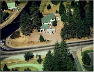 an aerial view of a house with swimming pool
