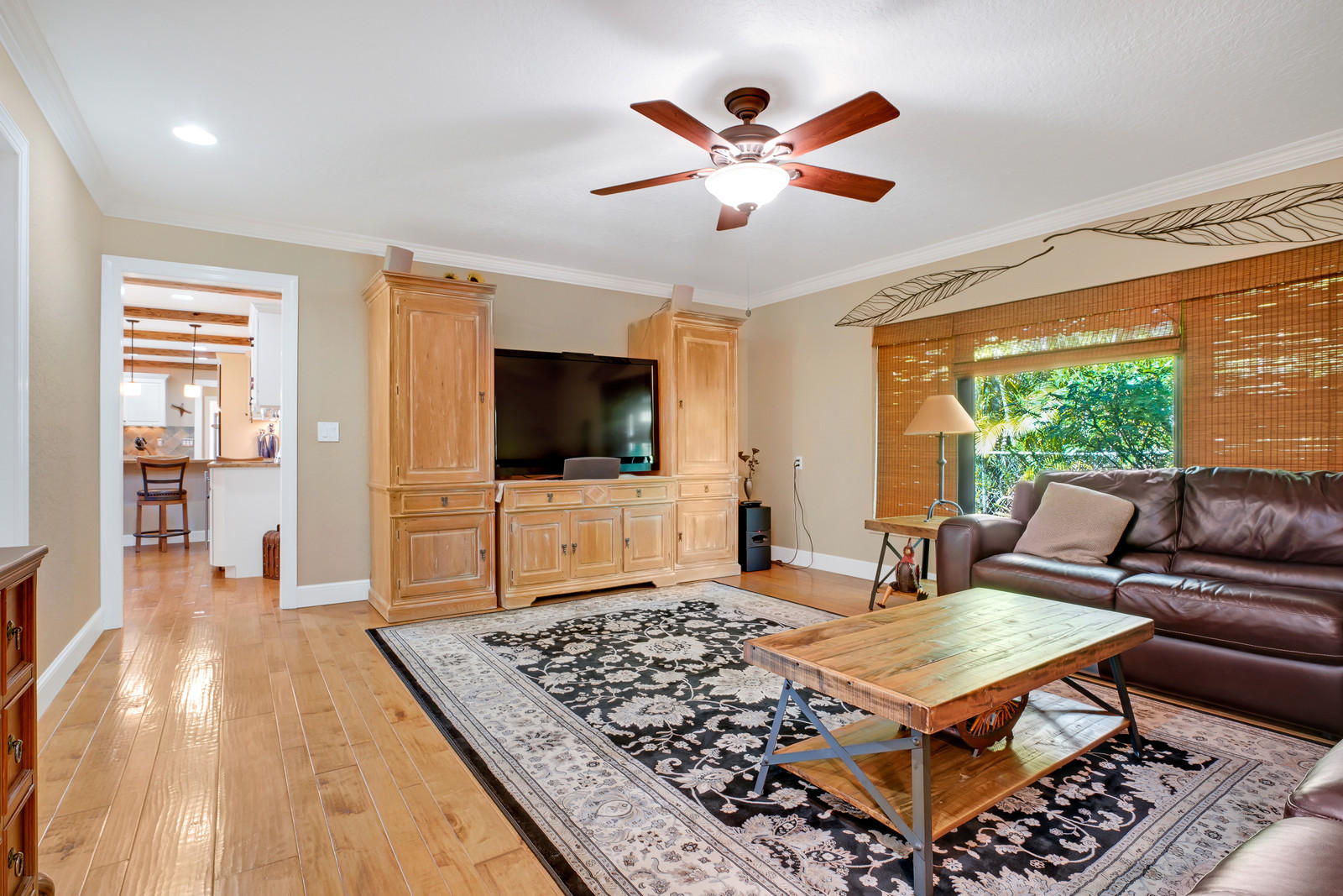 143 Point Circle Tequesta, FL 33469 - Photo 29 of 41 a living room with furniture and a flat screen tv