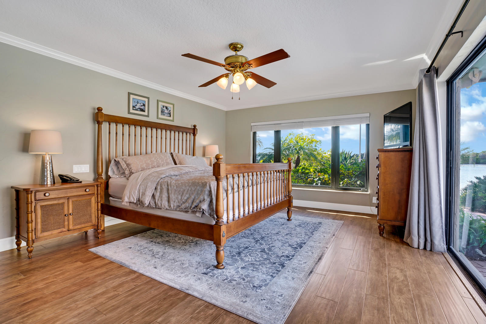 143 Point Circle Tequesta, FL 33469 - Photo 30 of 41 a bedroom with a bed and a window