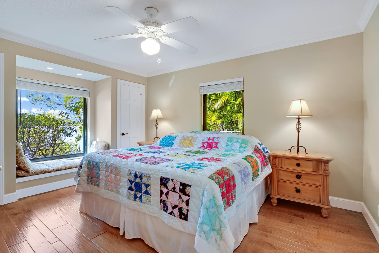 143 Point Circle Tequesta, FL 33469 - Photo 35 of 41 a bedroom with a bed and a chandelier