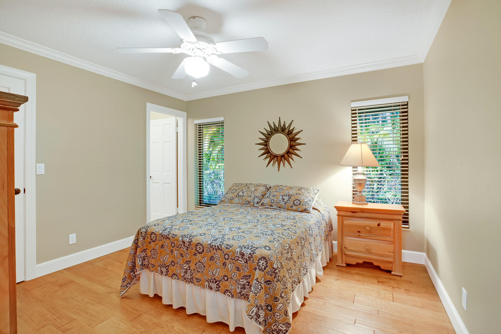 143 Point Circle Tequesta, FL 33469 - Photo 40 of 41 a bedroom with a bed and a window