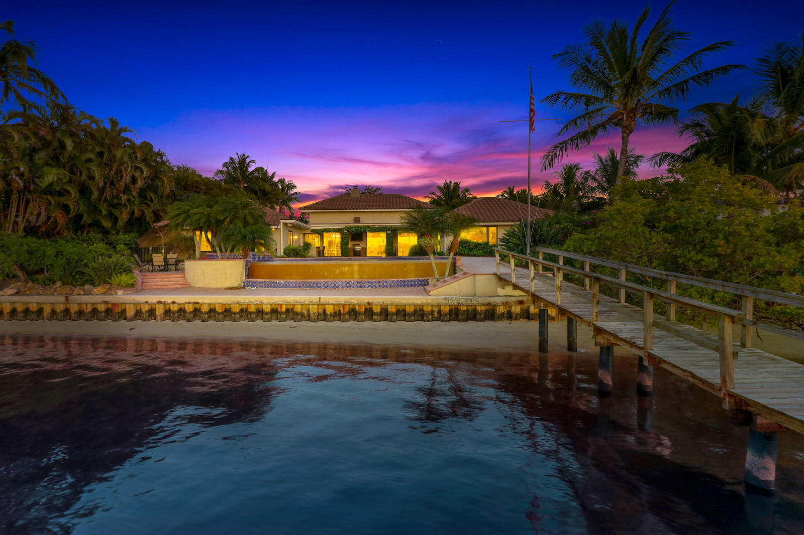 143 Point Circle Tequesta, FL 33469 - Photo 5 of 41 a view of a balcony with swimming pool