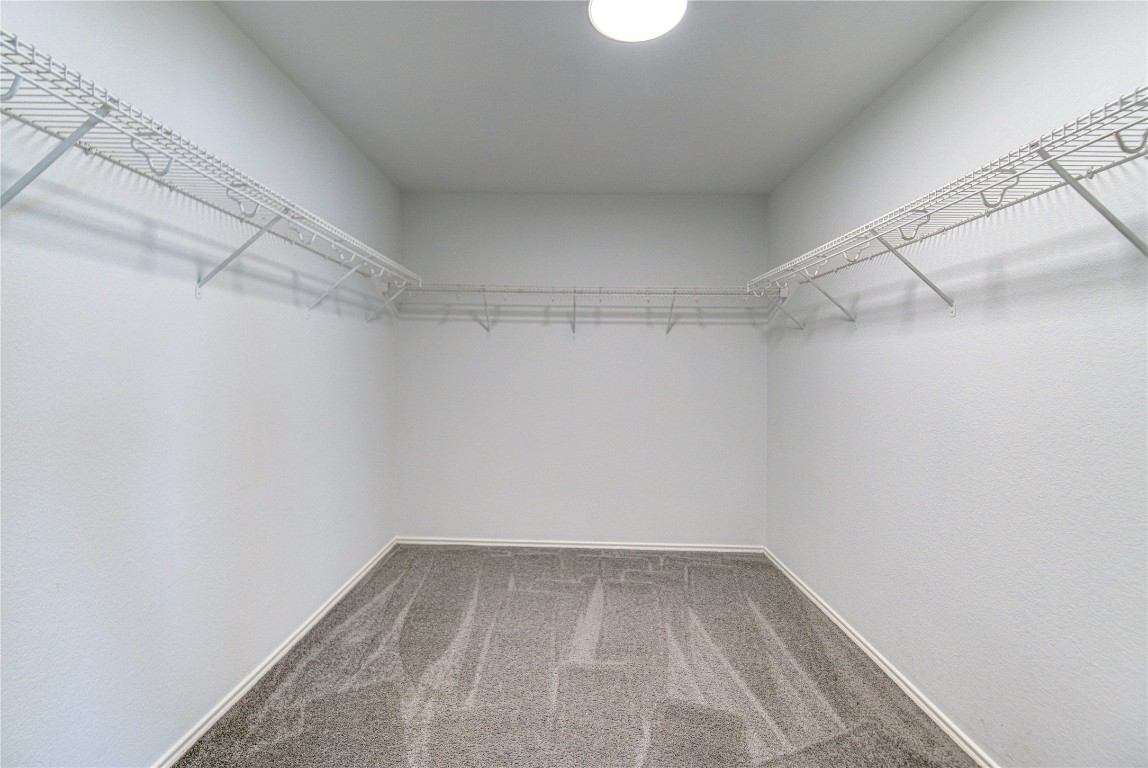 22919 Twisting Maple Court Spring, TX 77373 - Photo 35 of 49 a view of a room with racks on the wall