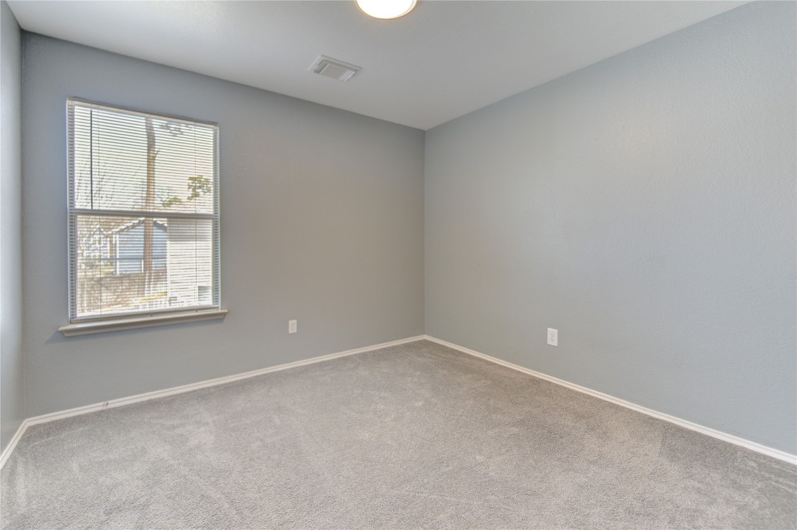 22919 Twisting Maple Court Spring, TX 77373 - Photo 40 of 49 an empty room with windows