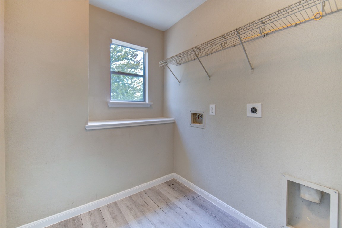22919 Twisting Maple Court Spring, TX 77373 - Photo 42 of 49 a view of a small space with wooden floor and a window