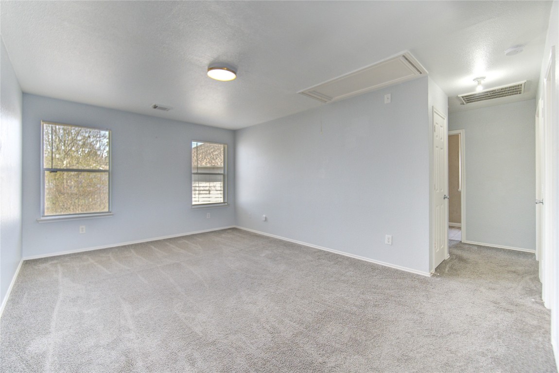22919 Twisting Maple Court Spring, TX 77373 - Photo 47 of 49 a view of an empty room with windows