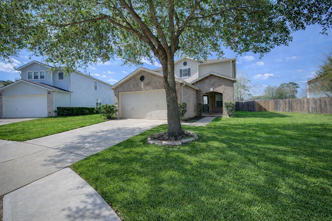 22919 Twisting Maple Court Spring, TX 77373 - Photo 49 of 49 a front view of house with yard and green space