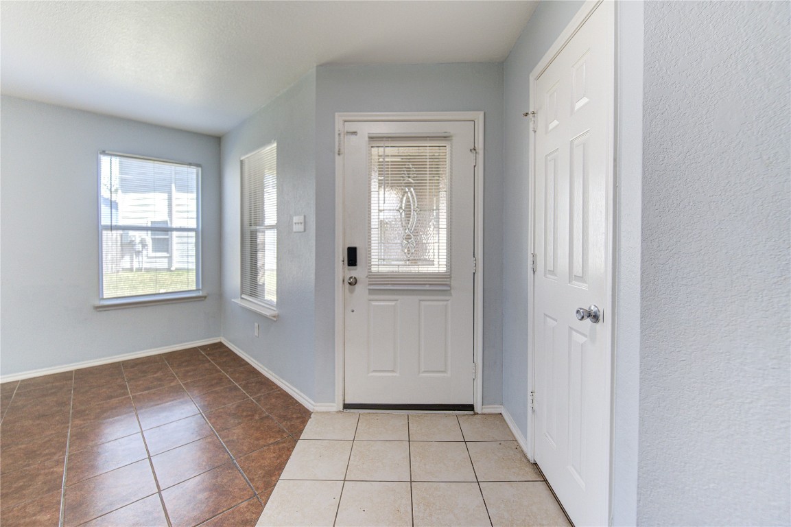 22919 Twisting Maple Court Spring, TX 77373 - Photo 5 of 49 an empty room with windows and closet