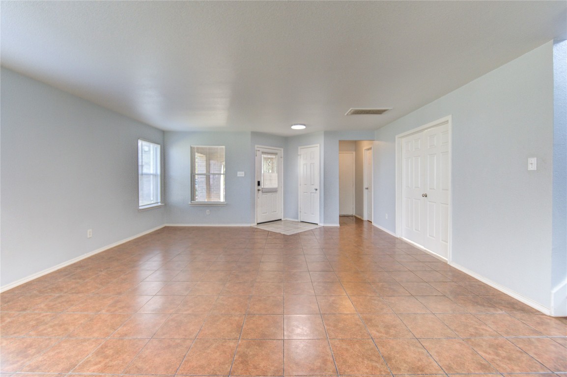 22919 Twisting Maple Court Spring, TX 77373 - Photo 10 of 49 a view of empty room with windows