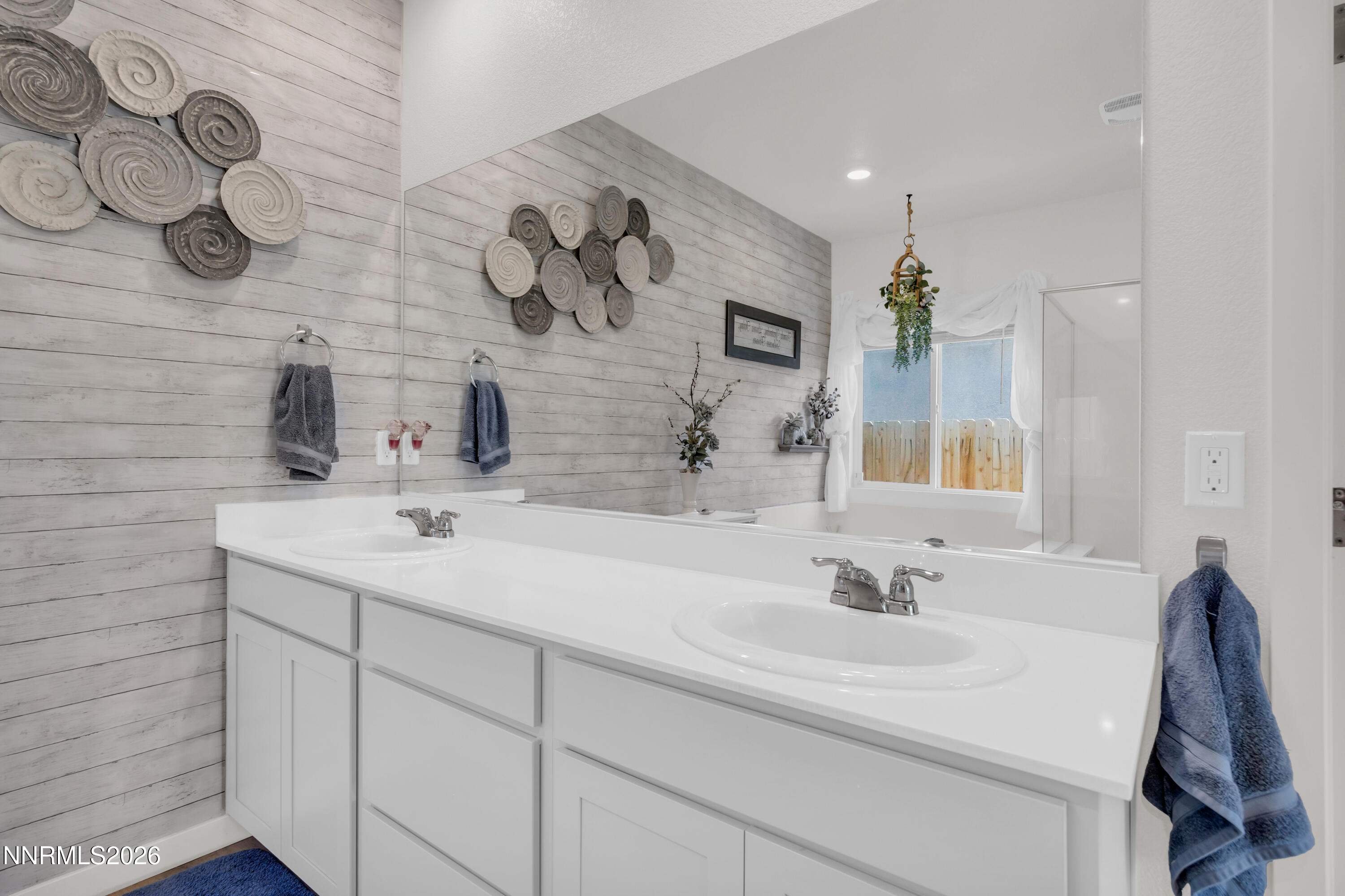 737 Butte Crk Road Dayton, NV 89403 - Photo 15 of 34 a bathroom with a sink and a mirror