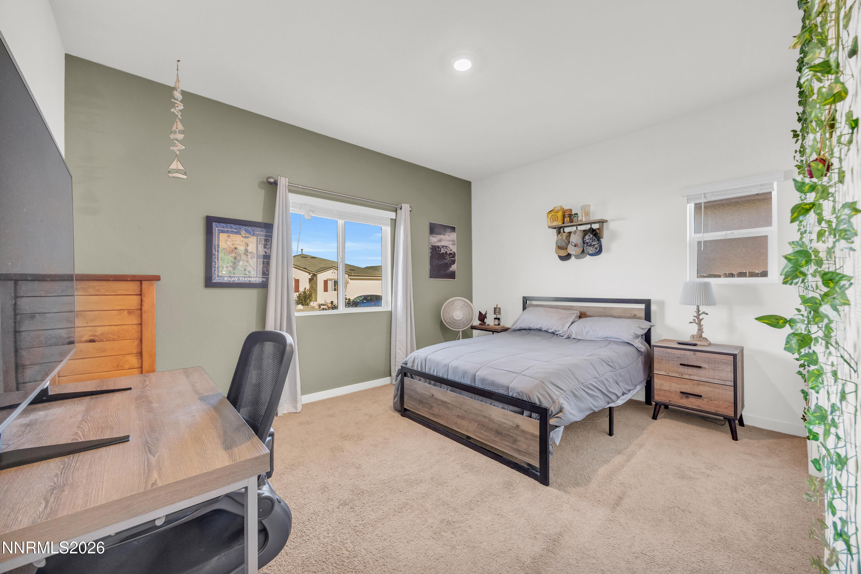 737 Butte Crk Road Dayton, NV 89403 - Photo 16 of 34 a spacious bedroom with a bed and a desk