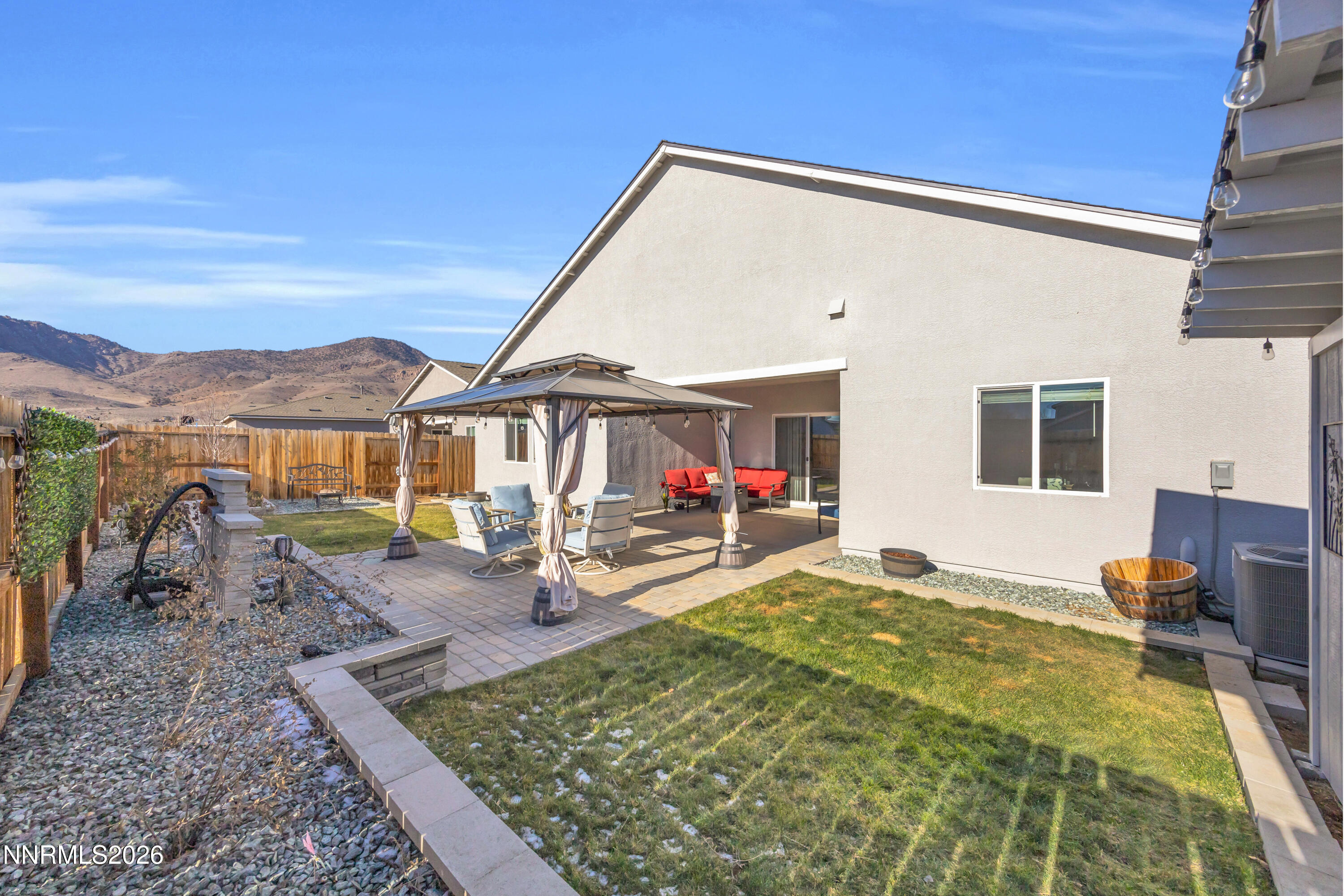 737 Butte Crk Road Dayton, NV 89403 - Photo 24 of 34 a view of a house with backyard porch and sitting area