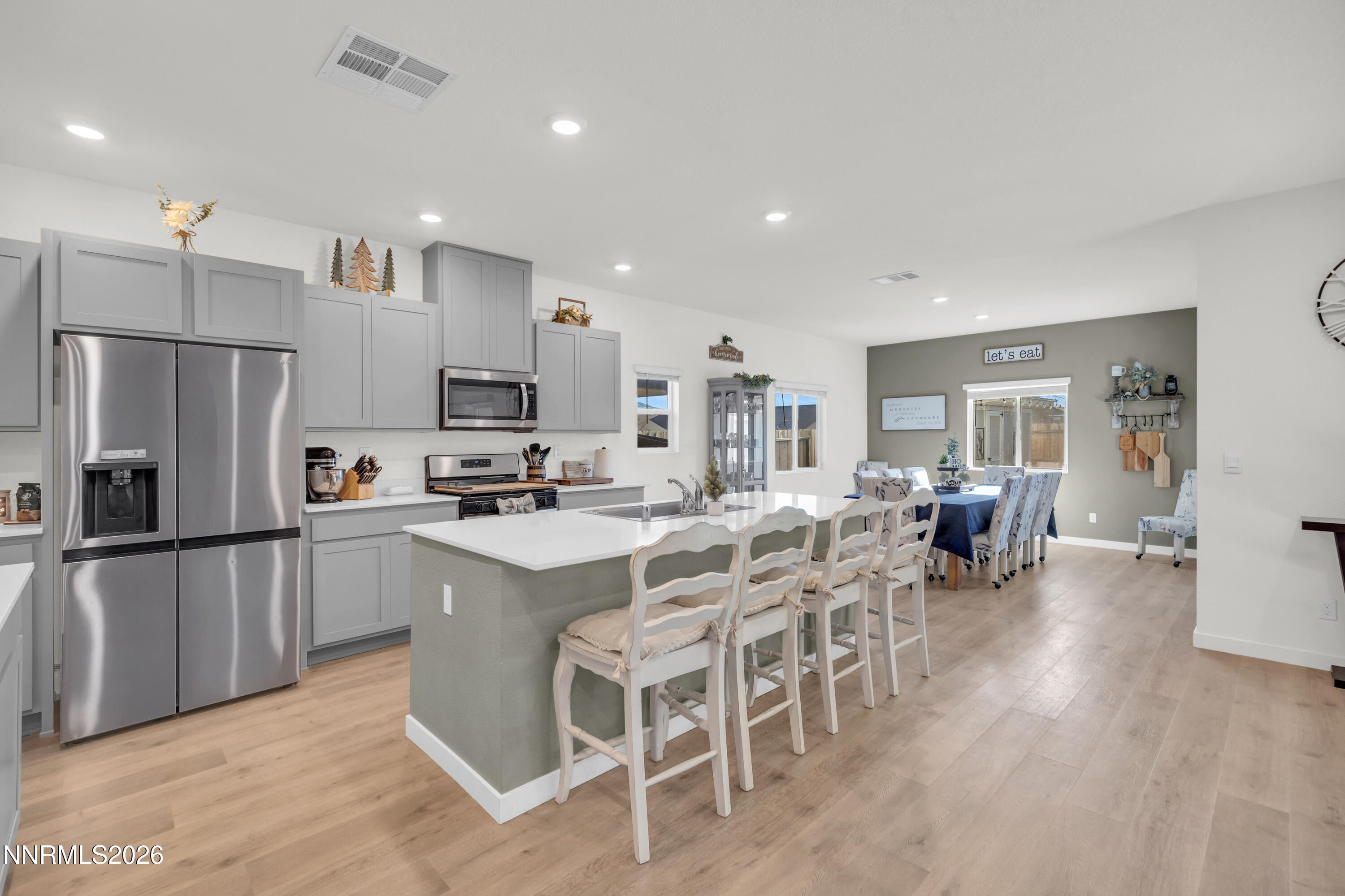 737 Butte Crk Road Dayton, NV 89403 - Photo 4 of 34 a kitchen with appliances a sink a counter top space and stainless steel appliances