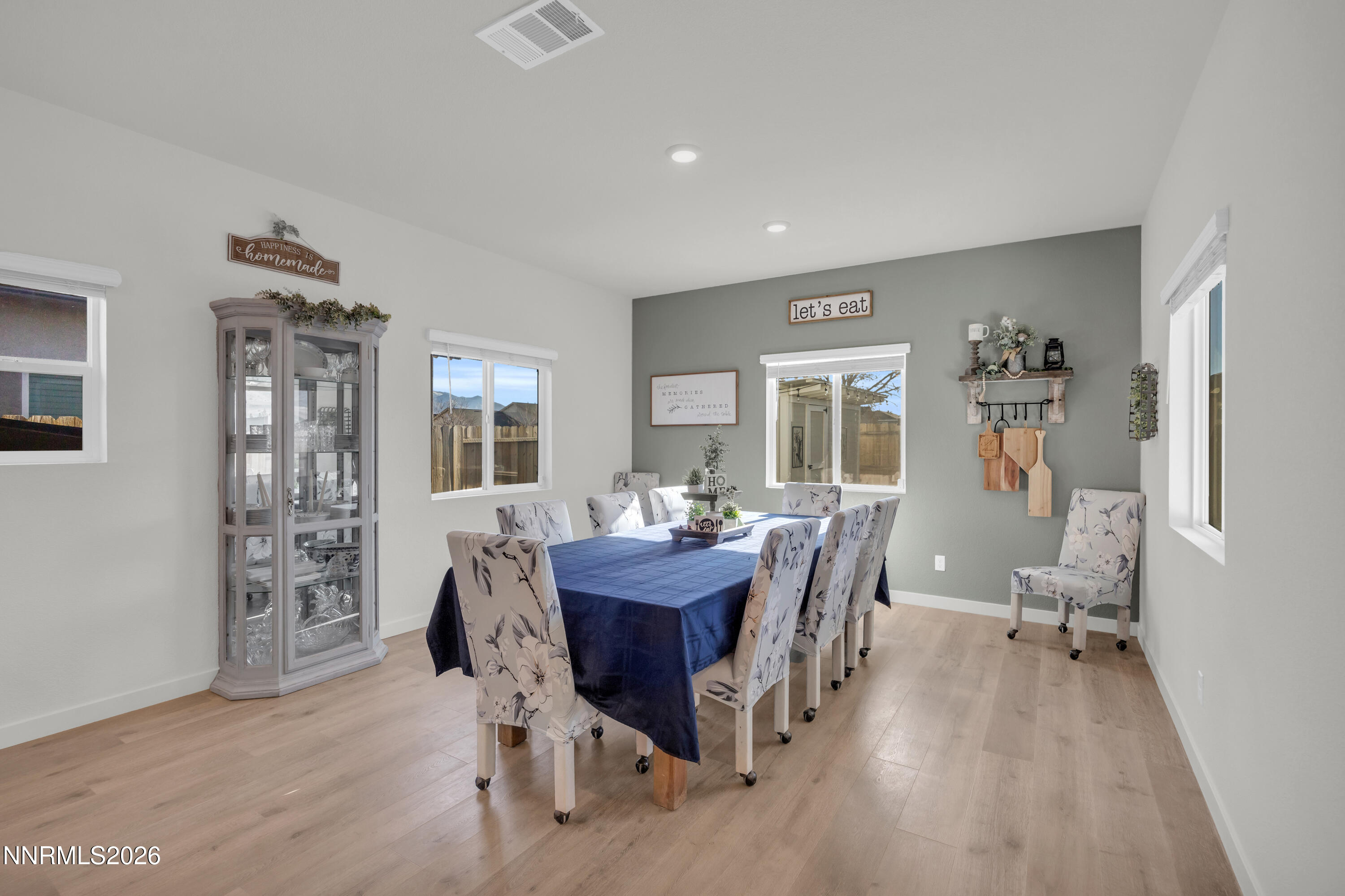 737 Butte Crk Road Dayton, NV 89403 - Photo 8 of 34 a view of a dining room with furniture window and wooden floor