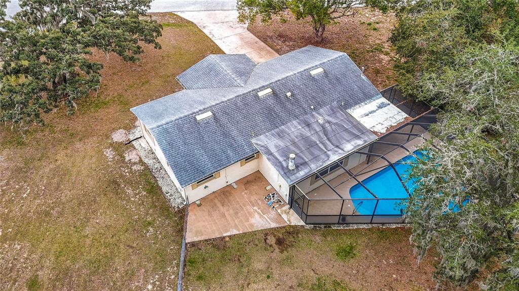 9171 Vicksburg Road Spring Hill, FL 34608 - Photo 43 of 55 an aerial view of a house