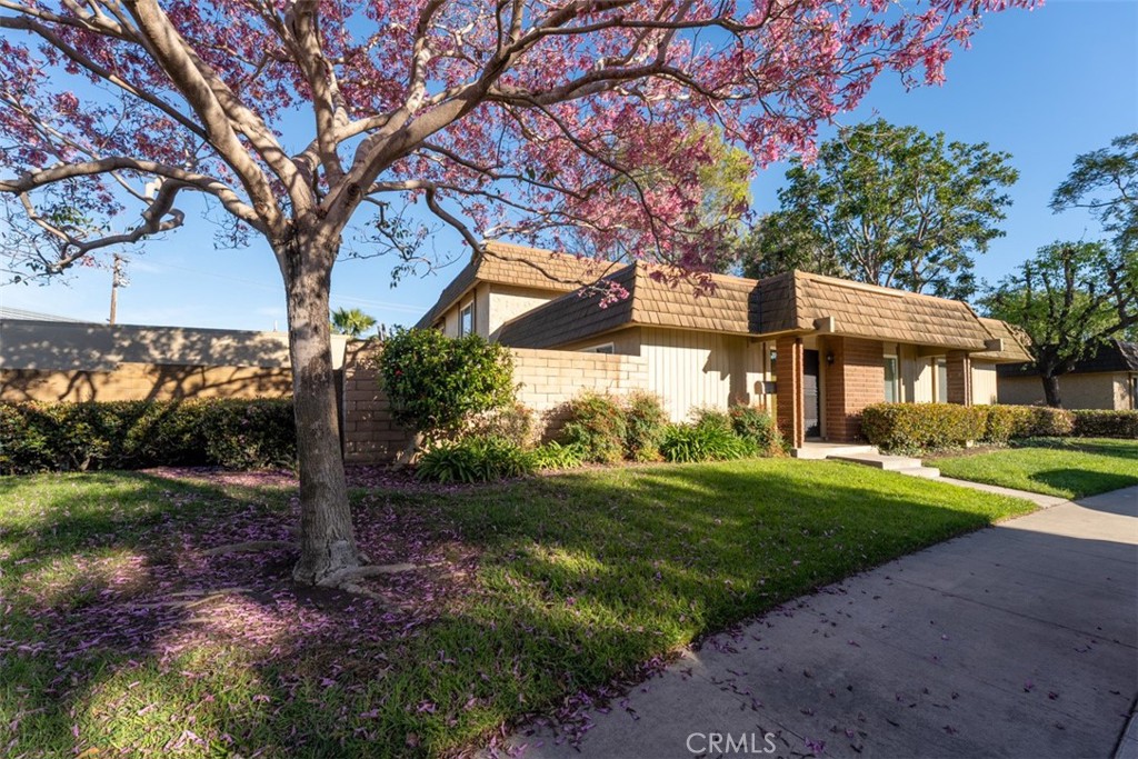 10454 Rio Grande Court Fountain Valley, CA 92708 - Photo 2 of 17 a view of a house with a yard