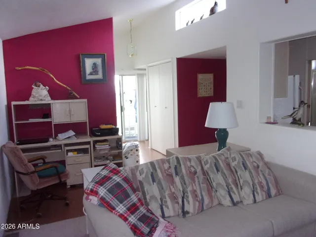 a kitchen with stainless steel appliances granite countertop a stove and a refrigerator