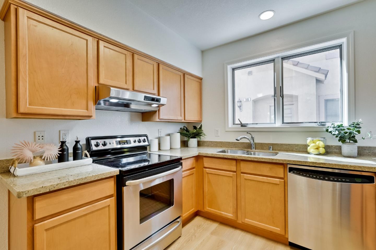 342 Bryant Street Mountain View, CA 94041 - Photo 12 of 43 a kitchen with stainless steel appliances granite countertop a sink stove and cabinets