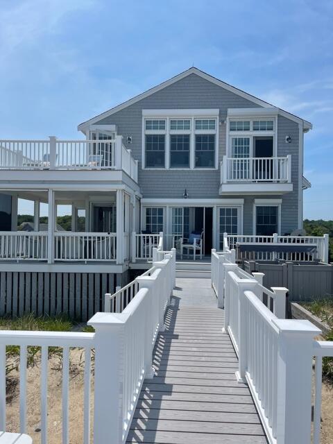 26 Salt Marsh Road East Sandwich, MA 02537 - Photo 2 of 31 a view of a house with a deck