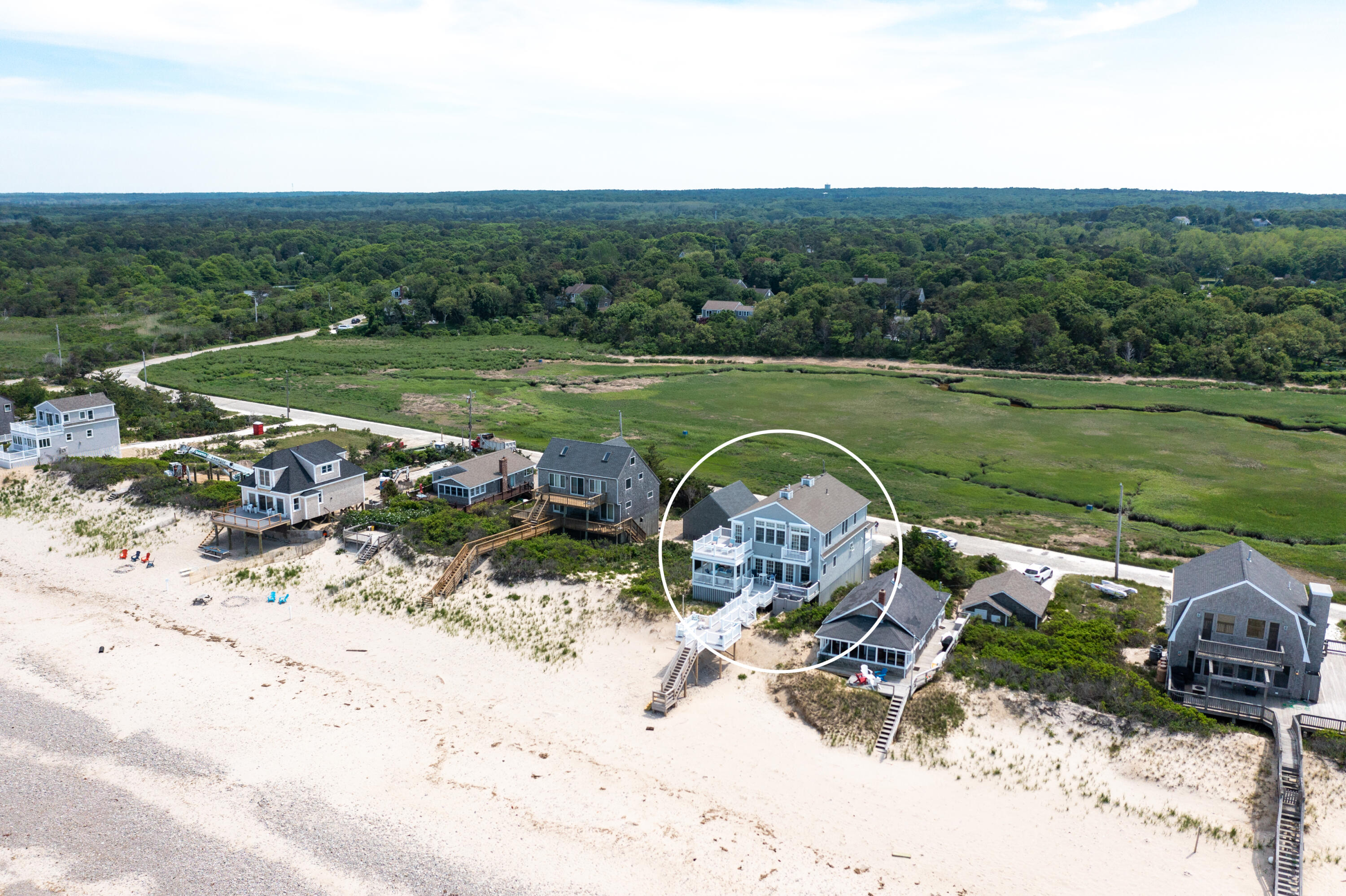 26 Salt Marsh Road East Sandwich, MA 02537 - Photo 30 of 31 a view of a lake with a yard and a wooden fence