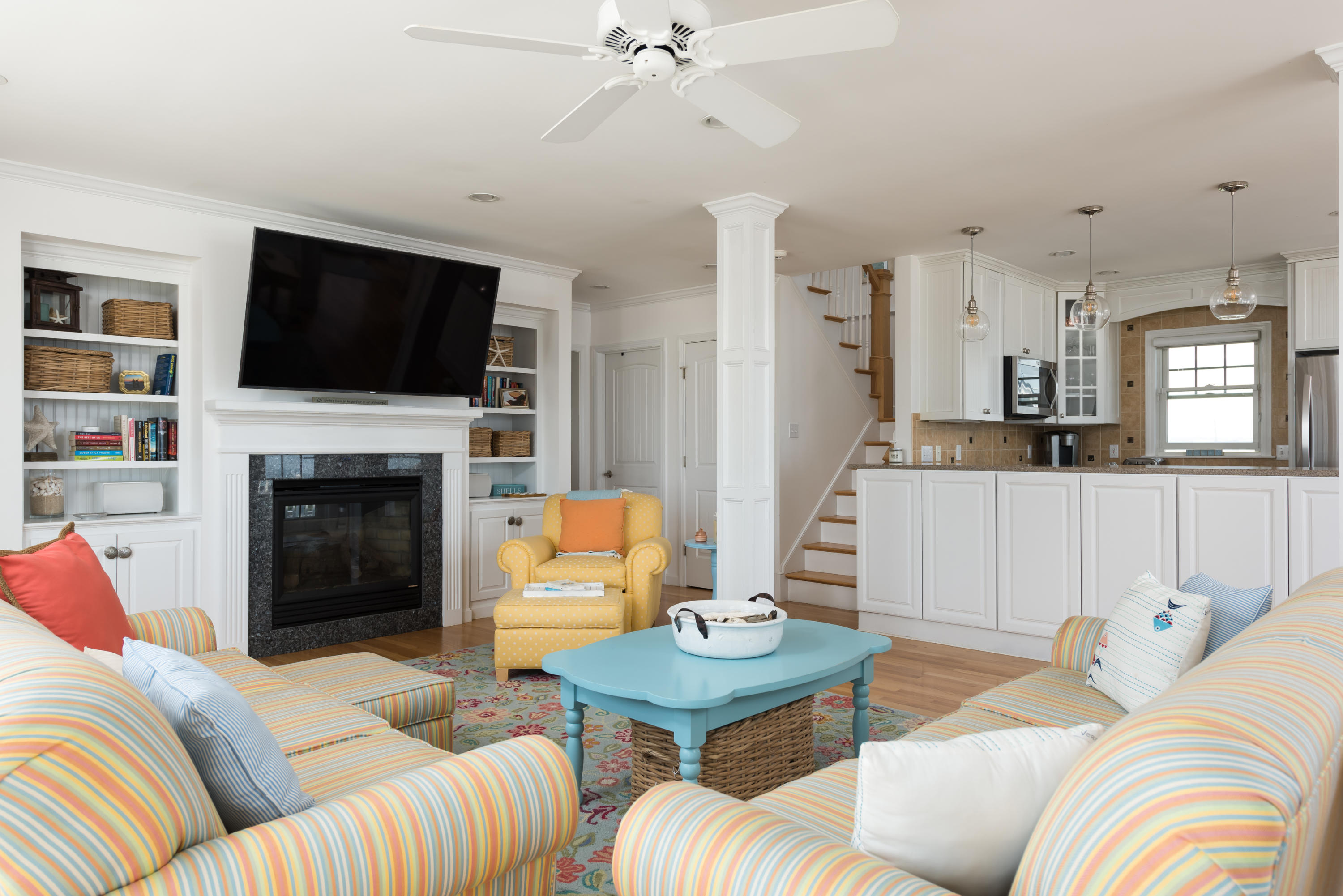 26 Salt Marsh Road East Sandwich, MA 02537 - Photo 8 of 31 a living room with furniture and a fireplace