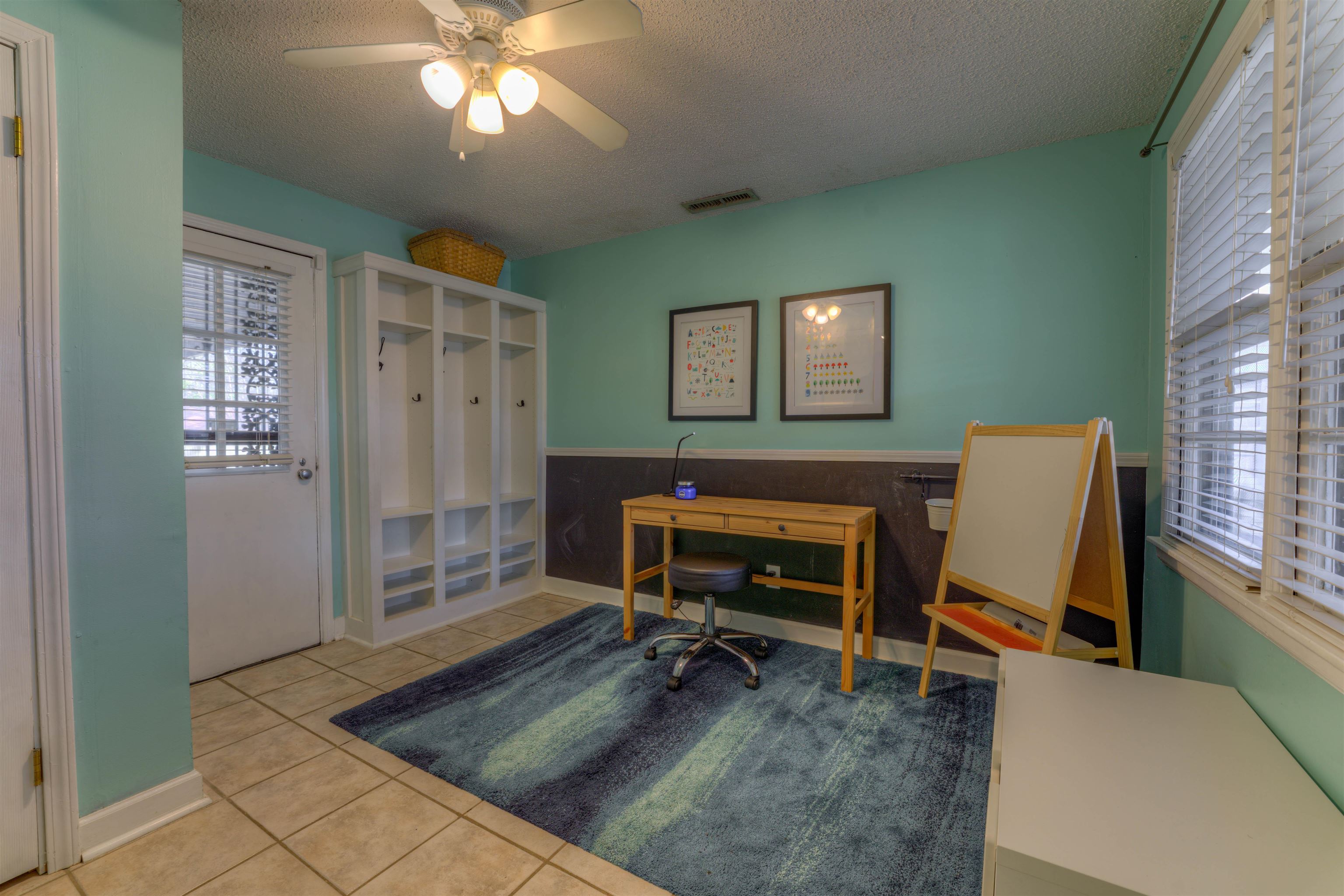 1083 Marcia Road Memphis, TN 38117 - Photo 6 of 11 a workspace with furniture and a window