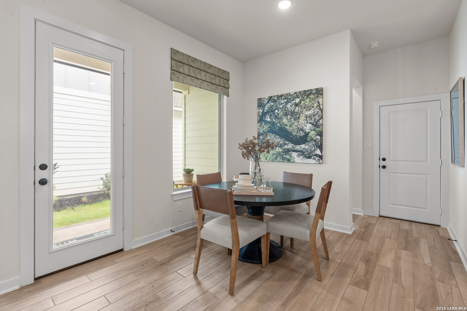 9435 Hidden Stone Schertz, TX 78154 - Photo 18 of 41 a view of a dining room with furniture and a window