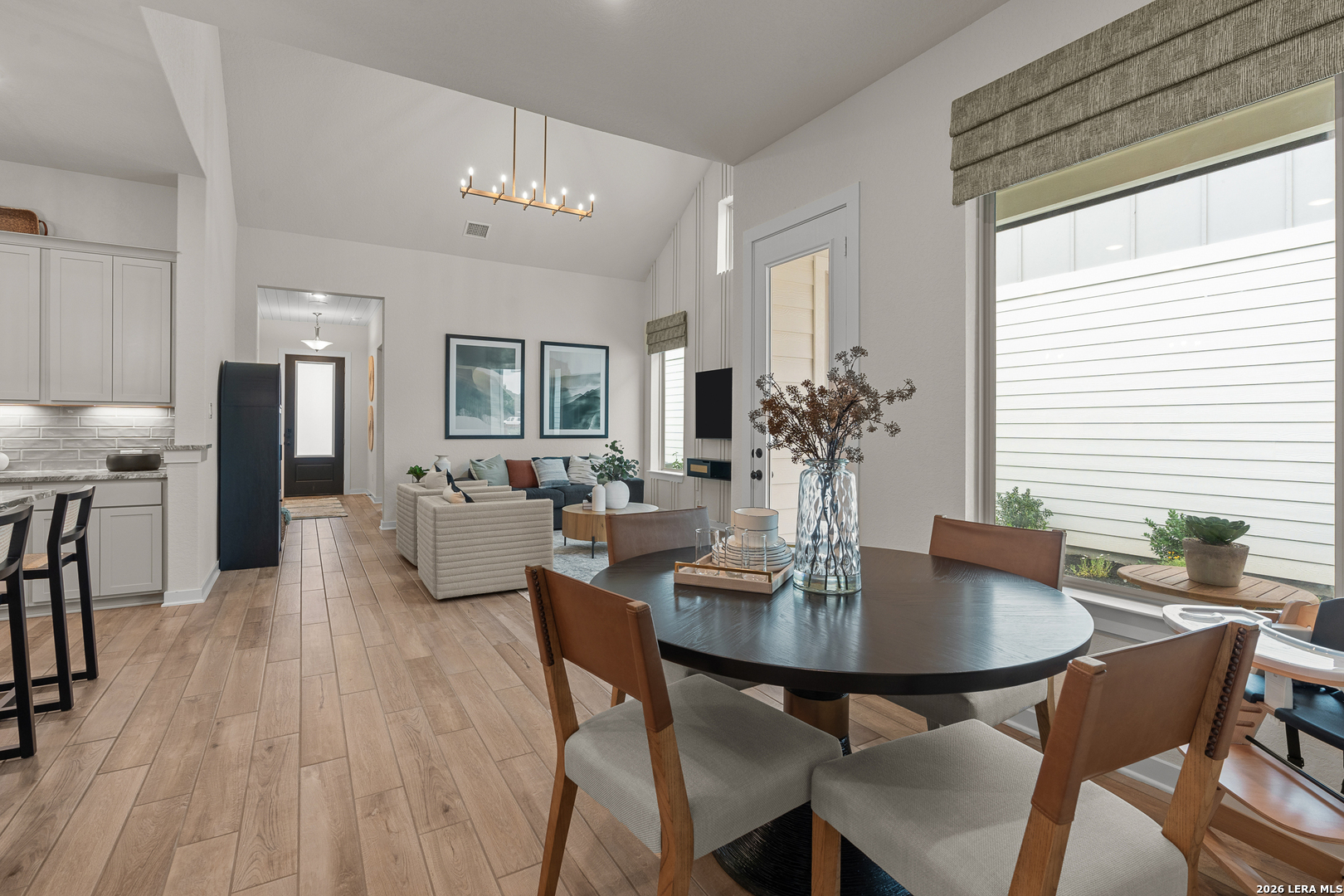 9435 Hidden Stone Schertz, TX 78154 - Photo 19 of 41 a view of a dining room with furniture and wooden floor
