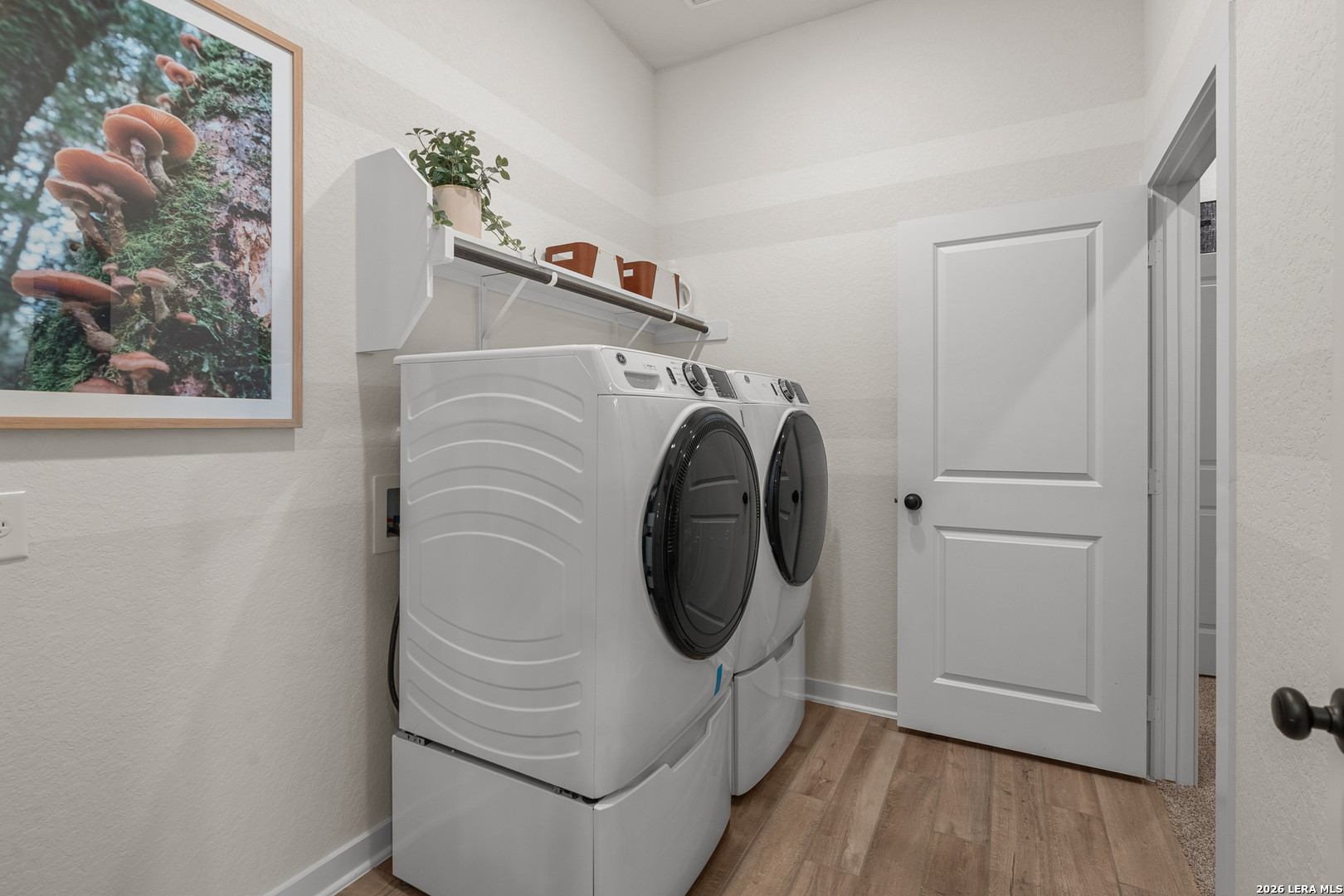 9435 Hidden Stone Schertz, TX 78154 - Photo 27 of 41 a utility room with dryer and washer