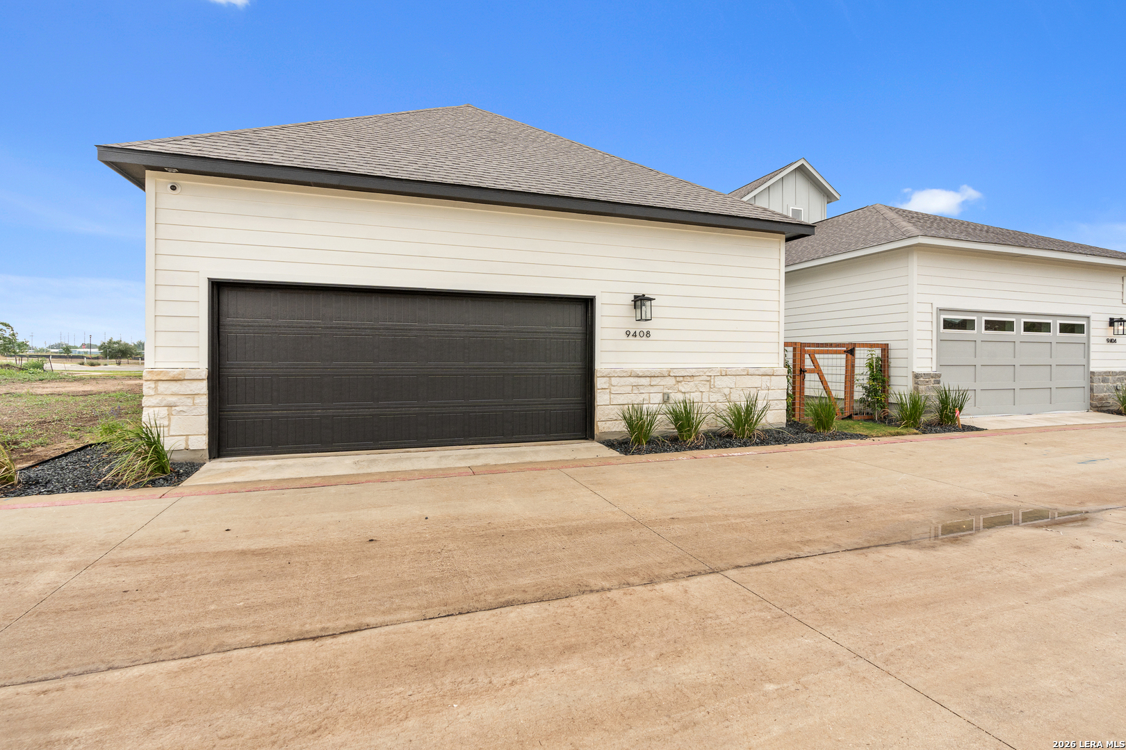 9435 Hidden Stone Schertz, TX 78154 - Photo 31 of 41 a front view of a house with a yard and garage