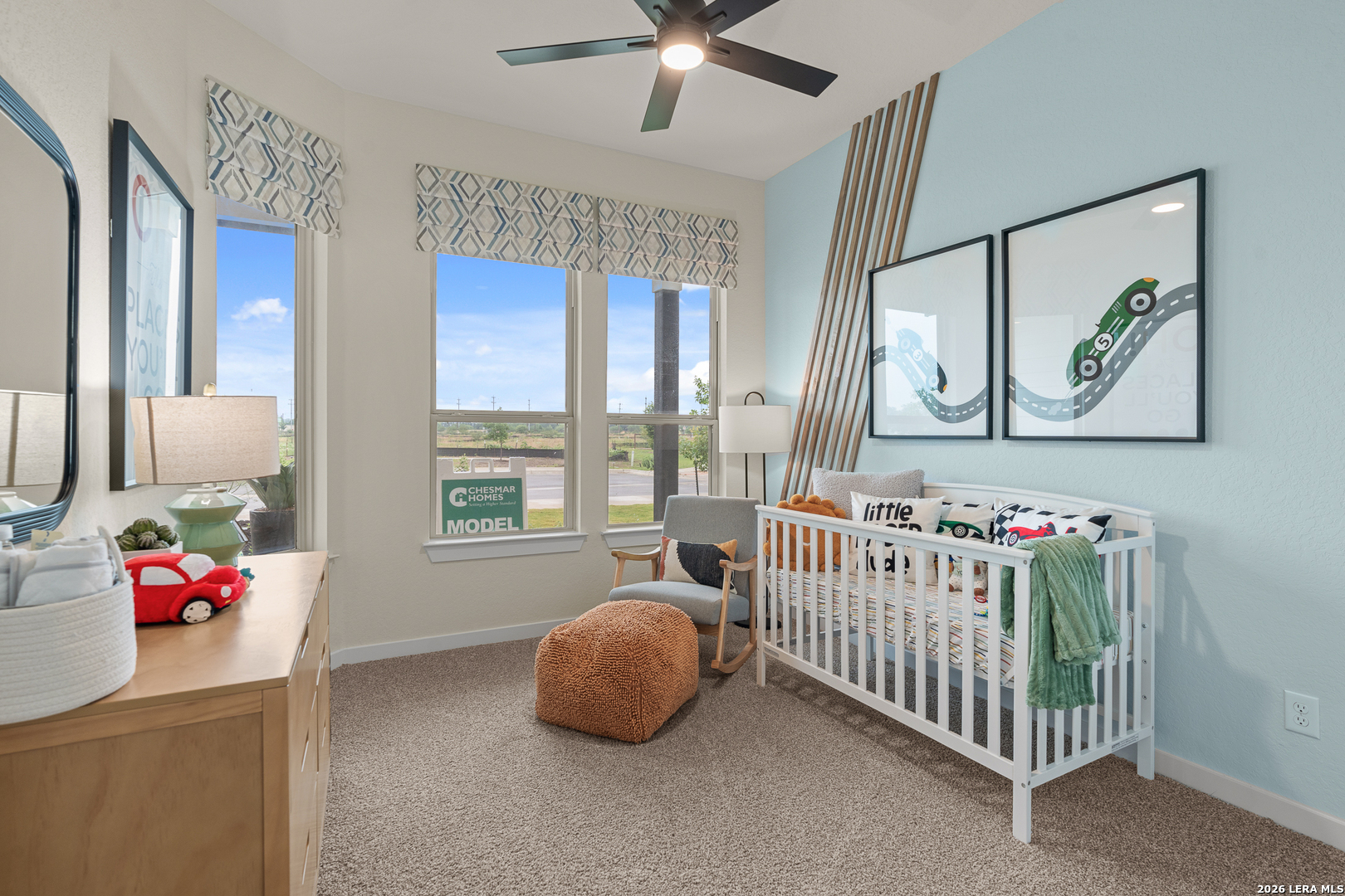 9435 Hidden Stone Schertz, TX 78154 - Photo 7 of 41 a bedroom with furniture and a large window