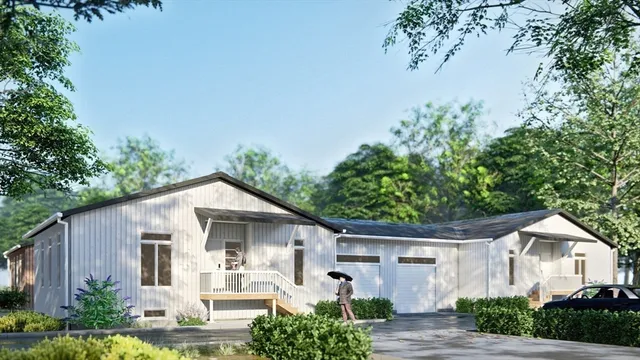 a front view of a house with garden