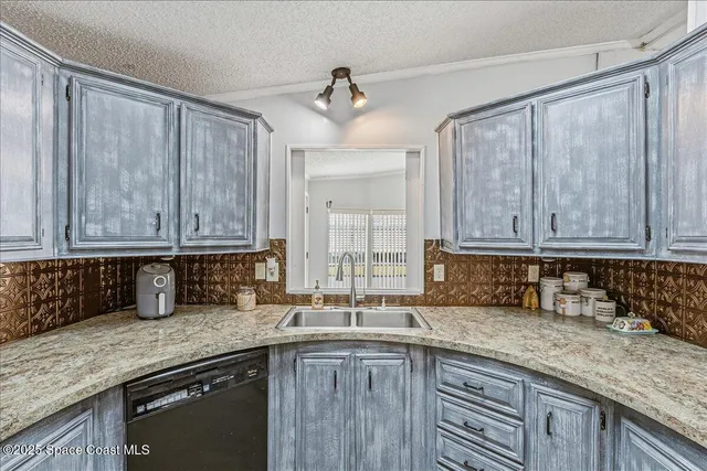 a view of livingroom with furniture and window