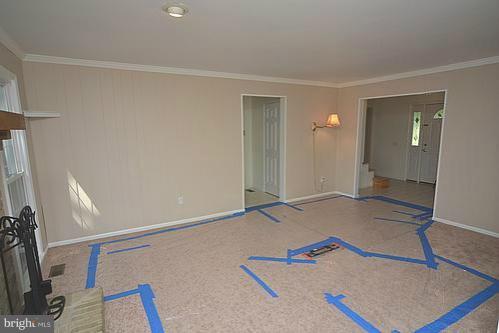 2207 Aventurine Way Silver Spring, MD 20904 - Photo 20 of 27 a view of a room with gym equipment