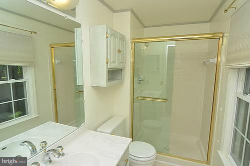 2207 Aventurine Way Silver Spring, MD 20904 - Photo 3 of 27 a bathroom with a shower and a toilet