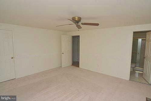 2207 Aventurine Way Silver Spring, MD 20904 - Photo 21 of 27 a view of a room with a ceiling fan