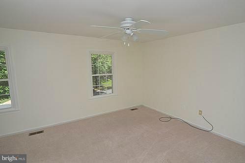 2207 Aventurine Way Silver Spring, MD 20904 - Photo 7 of 27 an empty room with a window