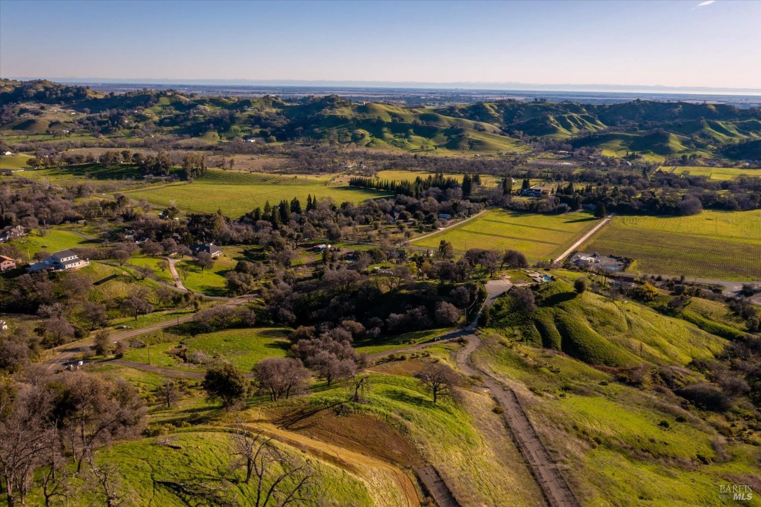 7031 Robindale Lane Vacaville, CA 95688 - Photo 16 of 42 an aerial view of residential houses with outdoor space