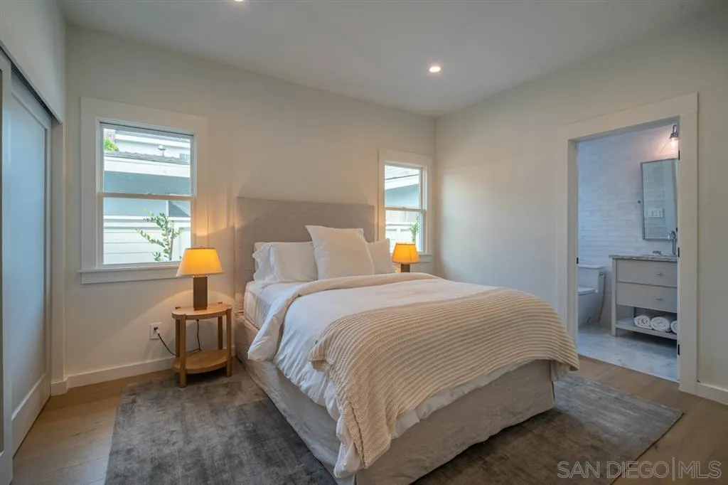 370 Glorietta Boulevard Coronado, CA 92118 - Photo 17 of 25 a bedroom with a bed and a window