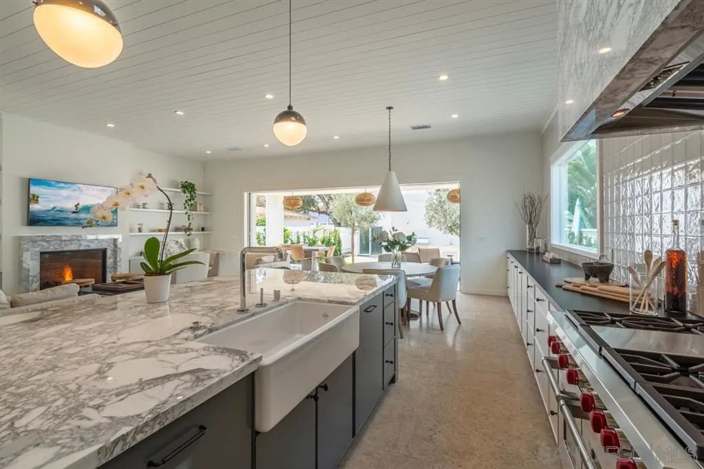 370 Glorietta Boulevard Coronado, CA 92118 - Photo 8 of 25 a kitchen with lots of counter space and windows